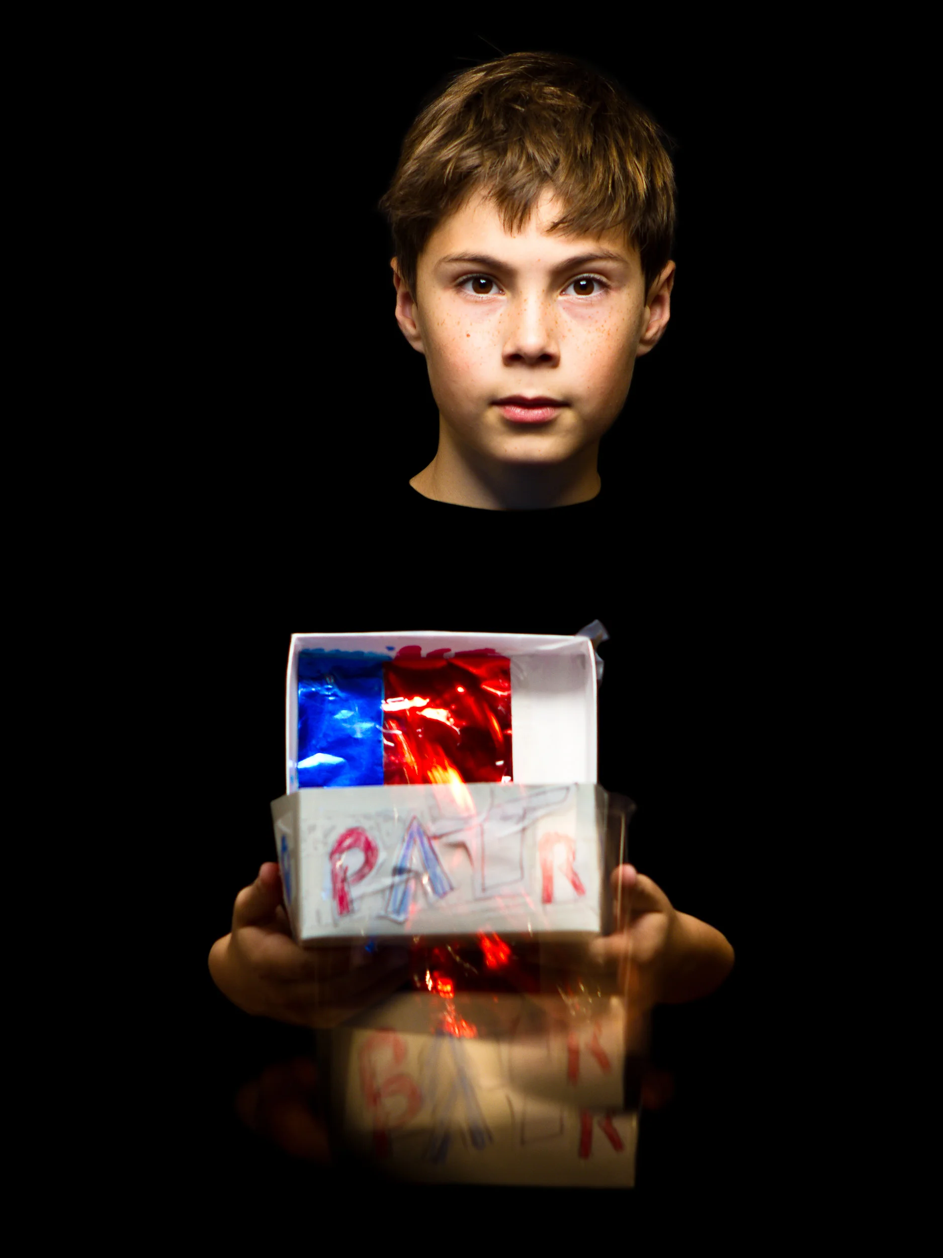 I picked the Patriots box because I love the Patriots. I also like splatter paint so I put spatter paint on my box. I cut out letters spelling go Patriots and colored them. I put cool paper on the box. Diego V. Friends Academy 4th Grade, Massachusetts 2011