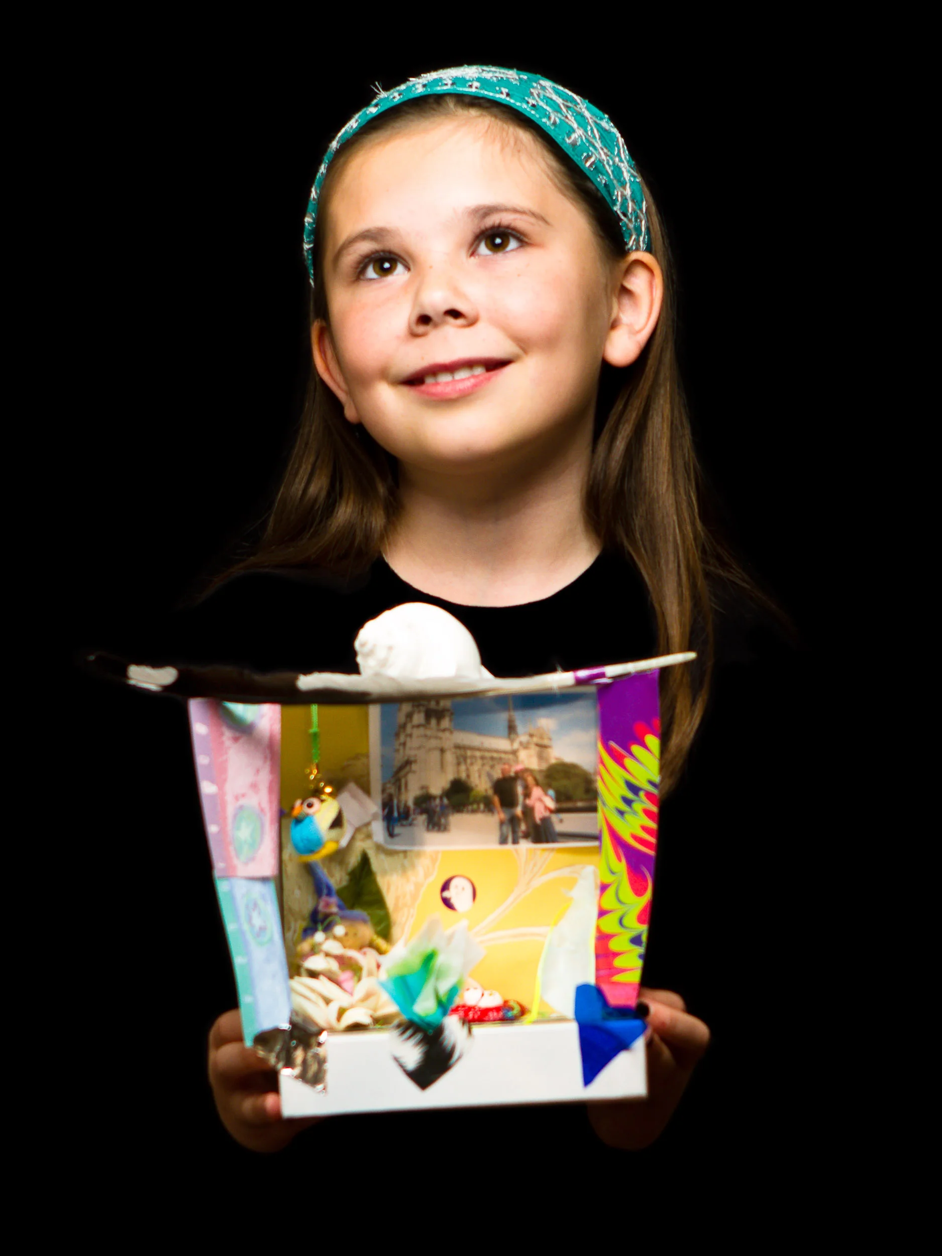 My box represents what I believe in. I believe in fairies, my family, my friends, and nature. I put in an owl because owls are my favorite animals. I also put in a book, a shell, a feather, and a cat because it represents what I like to do. I like to read, go to the beach, play with my cats, and the feather is because I always wanted to fly! Hannah H. 4th Grade, Massachusetts Friends Academy 2011