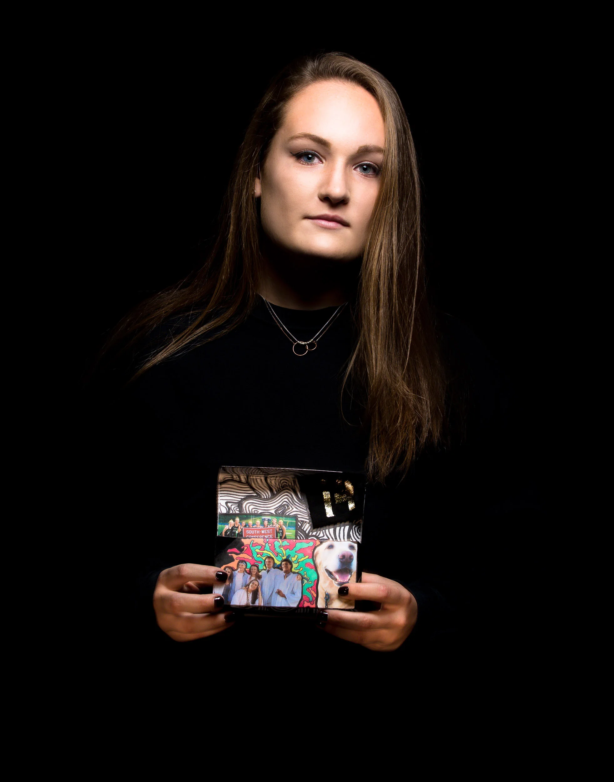 Olivia Pelzar Roger Williams University 2016 1. Three beliefs that I hold true, and find myself living by every day are compassion for others, resilience, and honesty. I would have t describe myself as a pretty blunt person, I am the type of person that will not wait and beat around the bush when I can knowingly do something to change a situation. Many of my beliefs originate from my dad, my two older brothers, and the soccer field. As I was going to write my heritage speech on, I grew up in a hardy tomboy lifestyle and was introduced to soccer at an early age. Early years of soccer teaches you just as much about life as is does to kick the ball, and one of the first life lessons of the game is to quickly get back up and keep playing after you’re knocked down. After soccer practice I would come home to my dad who would ask me about practice, and proceed to tell me what i should be doing better. My dad is where I learned that honestly (and the occasional brutal honesty) is the best way to get something done without confusion, and it was an effective way of building resilience aswell, I was never allowed to be a kid that got a trophy just for participating. Soon after, my brothers would normally arrive home from their practices and get the same speech. As you can tell this was not only a sport, it was a 24/7 lifestyle. So I grew up a pretty tough kid, and it wasn’t until my teen years that I witnessed the importance of compassion. In 2013 I began traveling on mission trips in and out of the country a few times a year, and my largest trip was to the town of Boscobel, Jamaica. I met some of the most amazing people of my life who live in drastically worse conditions than I could ever imagine. Before my mission trips to Bridgeport CT, Logan County WV, Atlantic City NJ, etc. I lived in a tight New England bubble, and found it easy to judge others outside of my realm, but now I look towards everyone with compassion and optimism. 2. In reading my top three beliefs above, I have a few ideas as to what I should put in my box. What is not mentioned above is my love for art, which I have been told I have excelled in for all of my life. I feel that my box would not be complete without some stylistic/design elements. One thing that I know will go in my box is a gold painted rock with the number 14 (my jersey number) written on one side, and the word believe written on the other. This rock was given to me by my high school lacrosse coach, each one of us received a rock. “Believe” was our word of the season that drove our once underdog team to the state championship, the first time in a decade. I believe that it was resilience that got us there. Also, I plan to put a picture of my dog, Abby, in the box because she has been my number one fan for the last 9 years. She is also a mark of determination for me, I had been begging for a dog from the time I could speak and my family finally caved into my constant nagging. These are the definite things I want