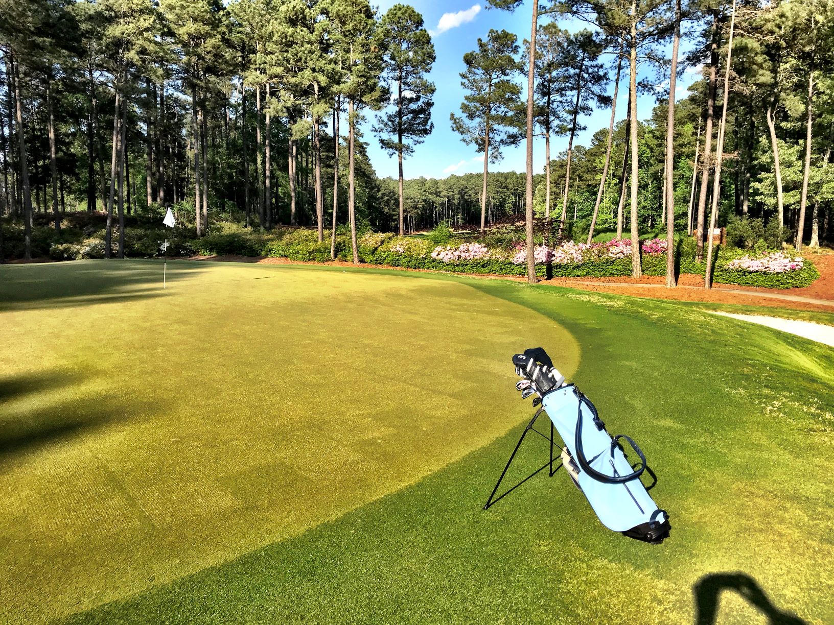 An embankment surrounding the green of the par-four fifth hole is a blaze of springtime color.