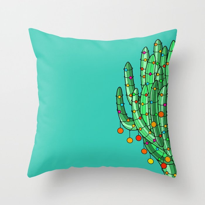 christmas-holiday-cactus-decorated-with-colorful-ornaments-on-turquoise-background-pillows.jpg