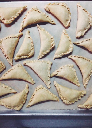 Empanadas full of brown butter chanterelle mushrooms, charred corn, and aged Monterey jack.