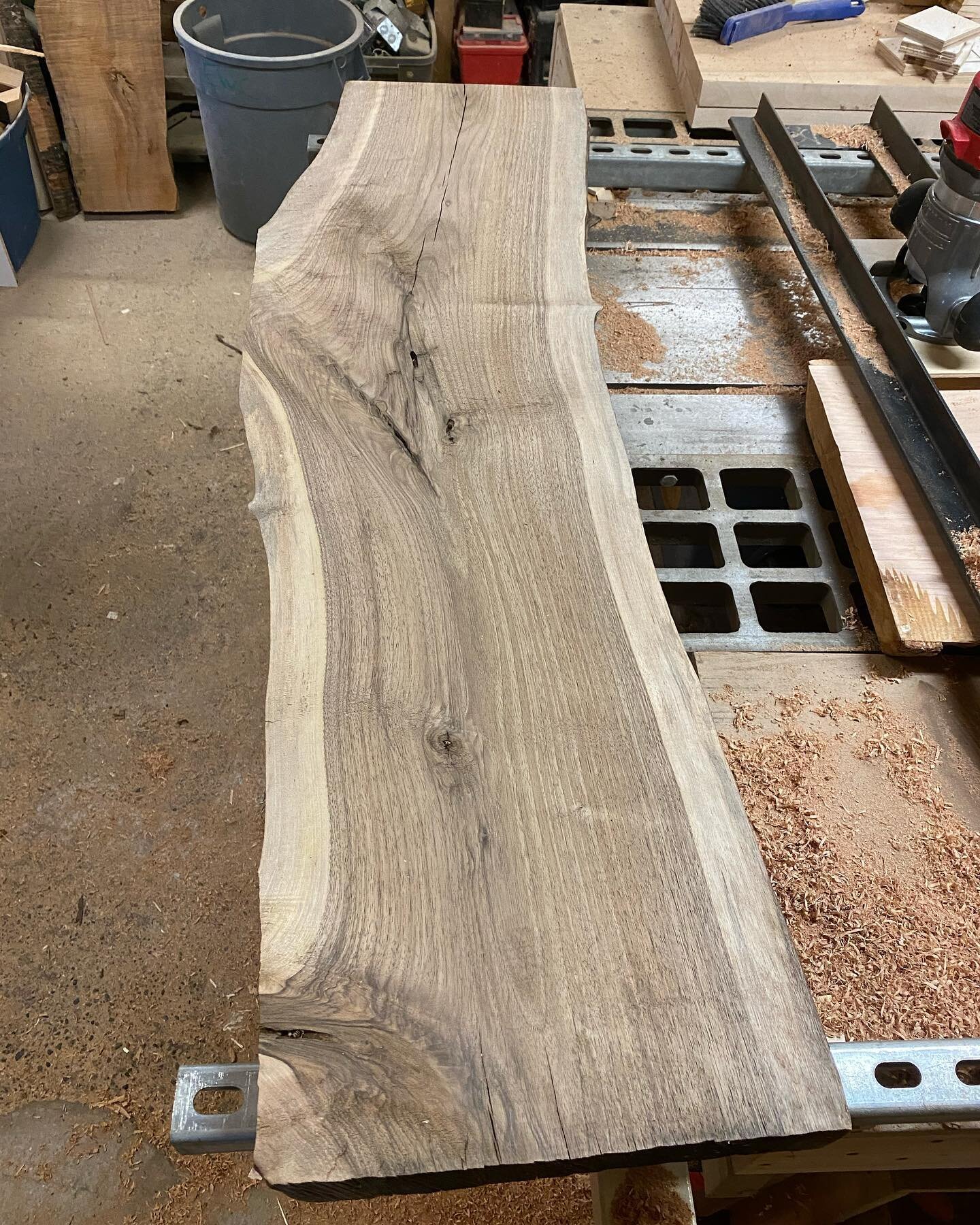 Flattened this stunning piece of English Walnut for a coffee table. A little bit of sanding and it&rsquo;ll be ready for stain. Excited to see how it shines when it&rsquo;s finished. #englishwalnut #walnut #slab #coffeetable #liveedge #furnituredesig