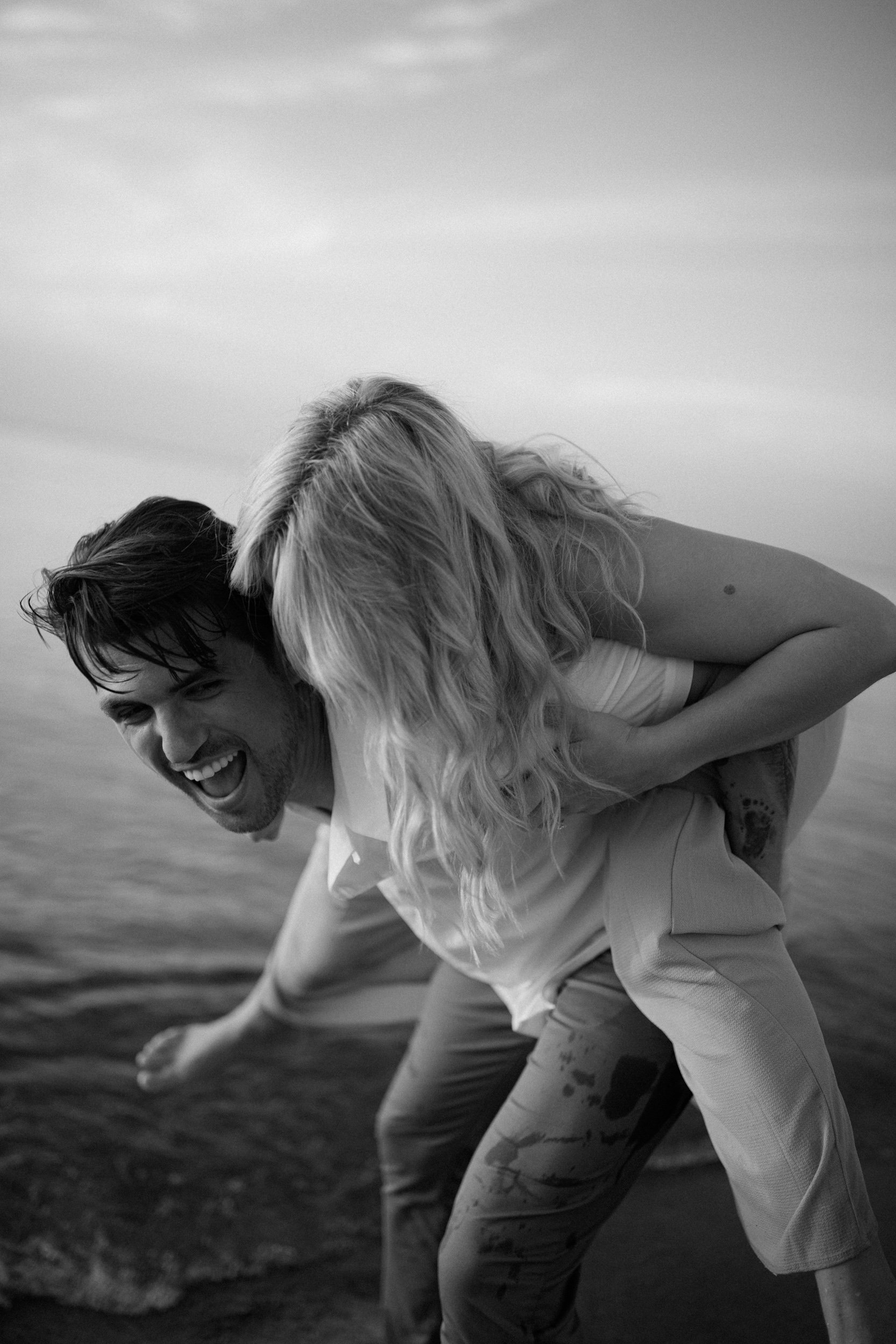 engagement-session-indiana-dunes-beach-northwest-michigan-city-carefree-lifestyle-fun-field-in-water-lake-26.jpg