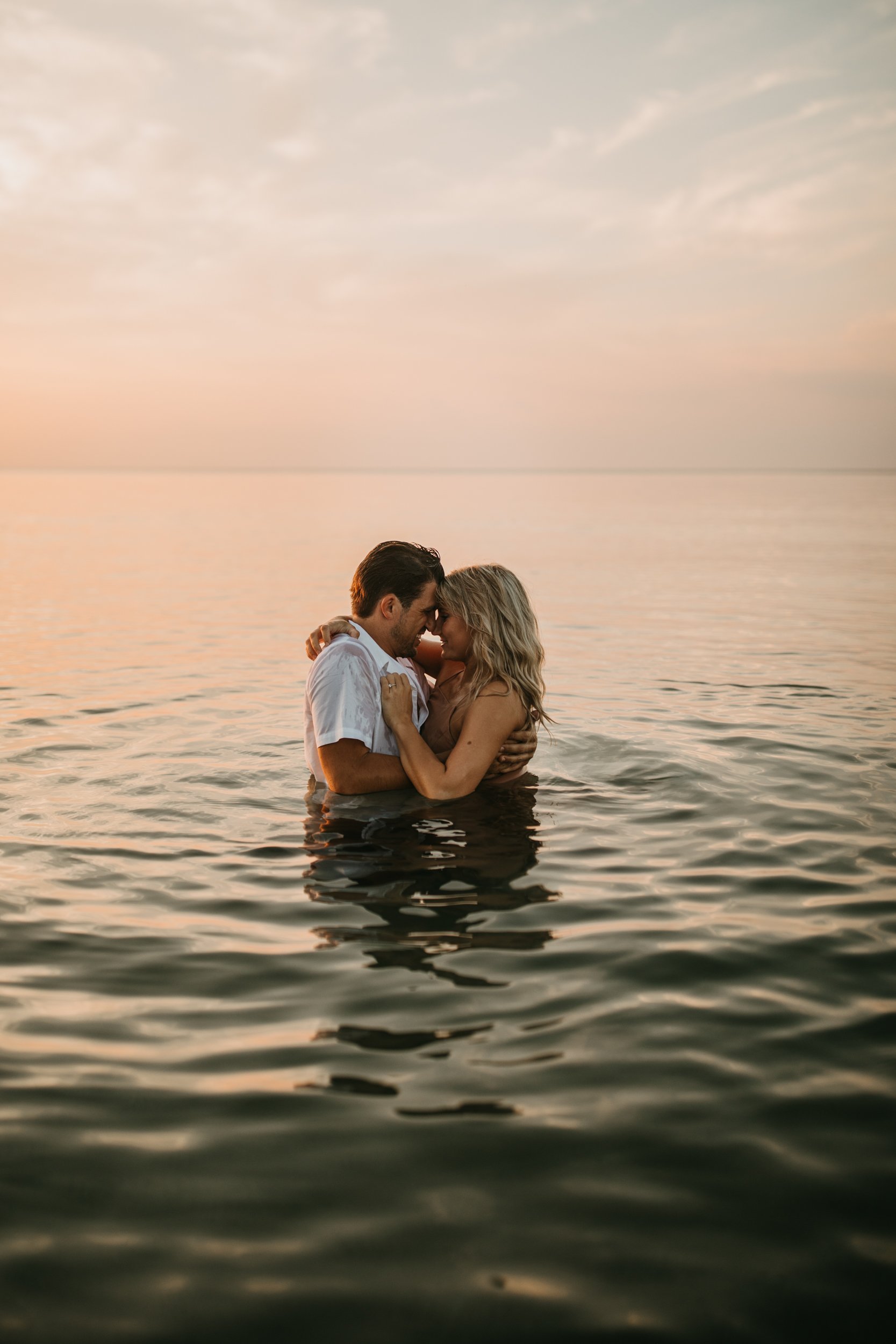 engagement-session-indiana-dunes-beach-northwest-michigan-city-carefree-lifestyle-fun-field-in-water-lake-31.jpg