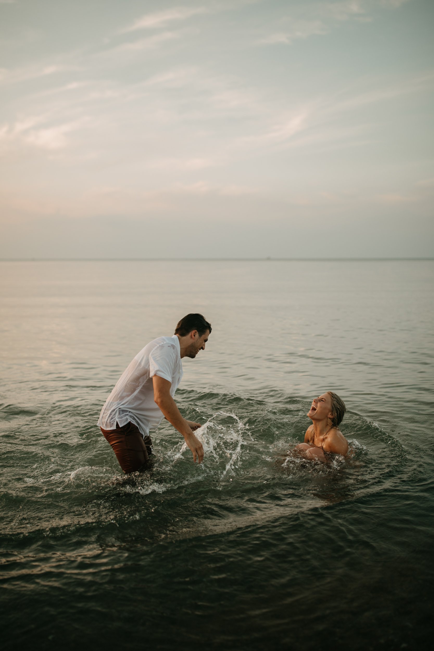 engagement-session-indiana-dunes-beach-northwest-michigan-city-carefree-lifestyle-fun-field-in-water-lake-36.jpg