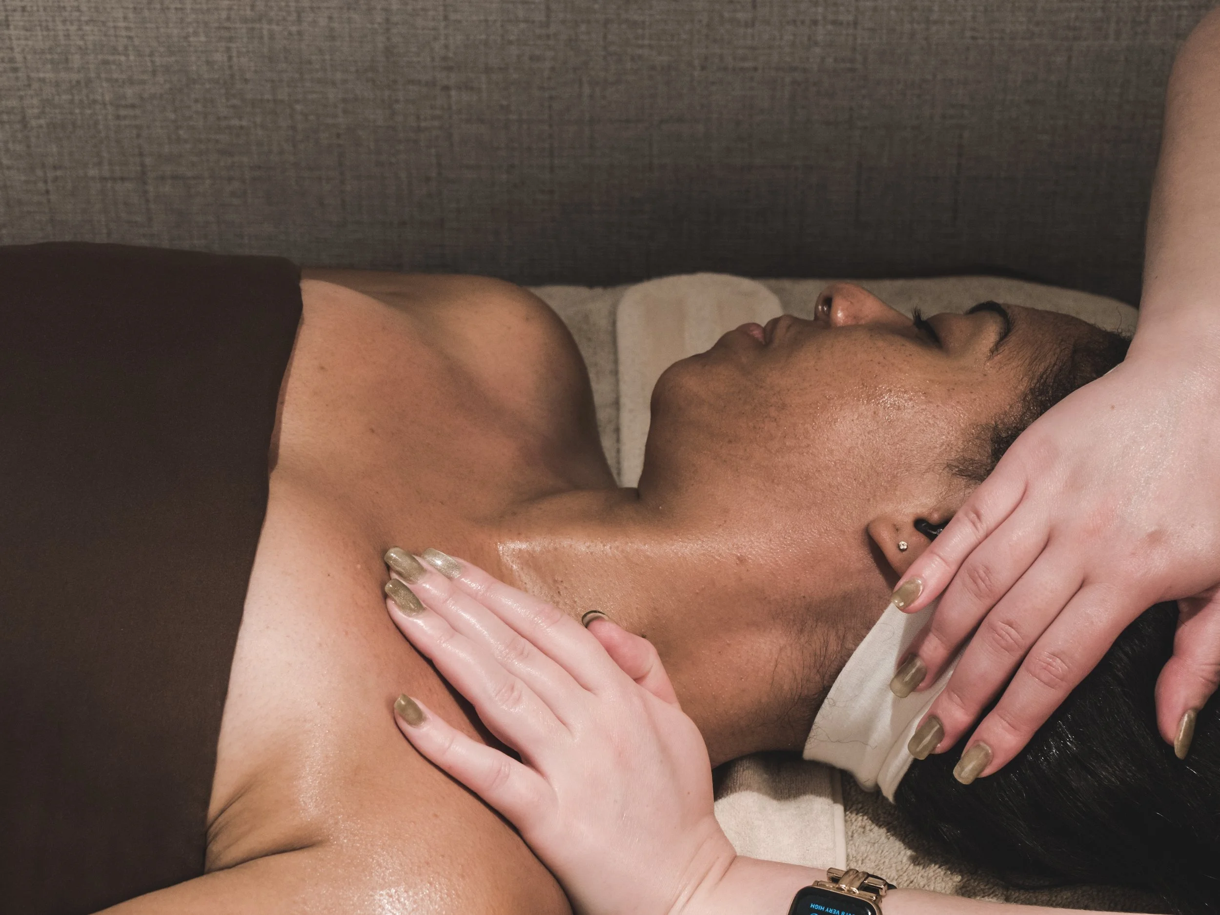 Client at Jalan Facial Spa receives decollete massage Greenwood Village