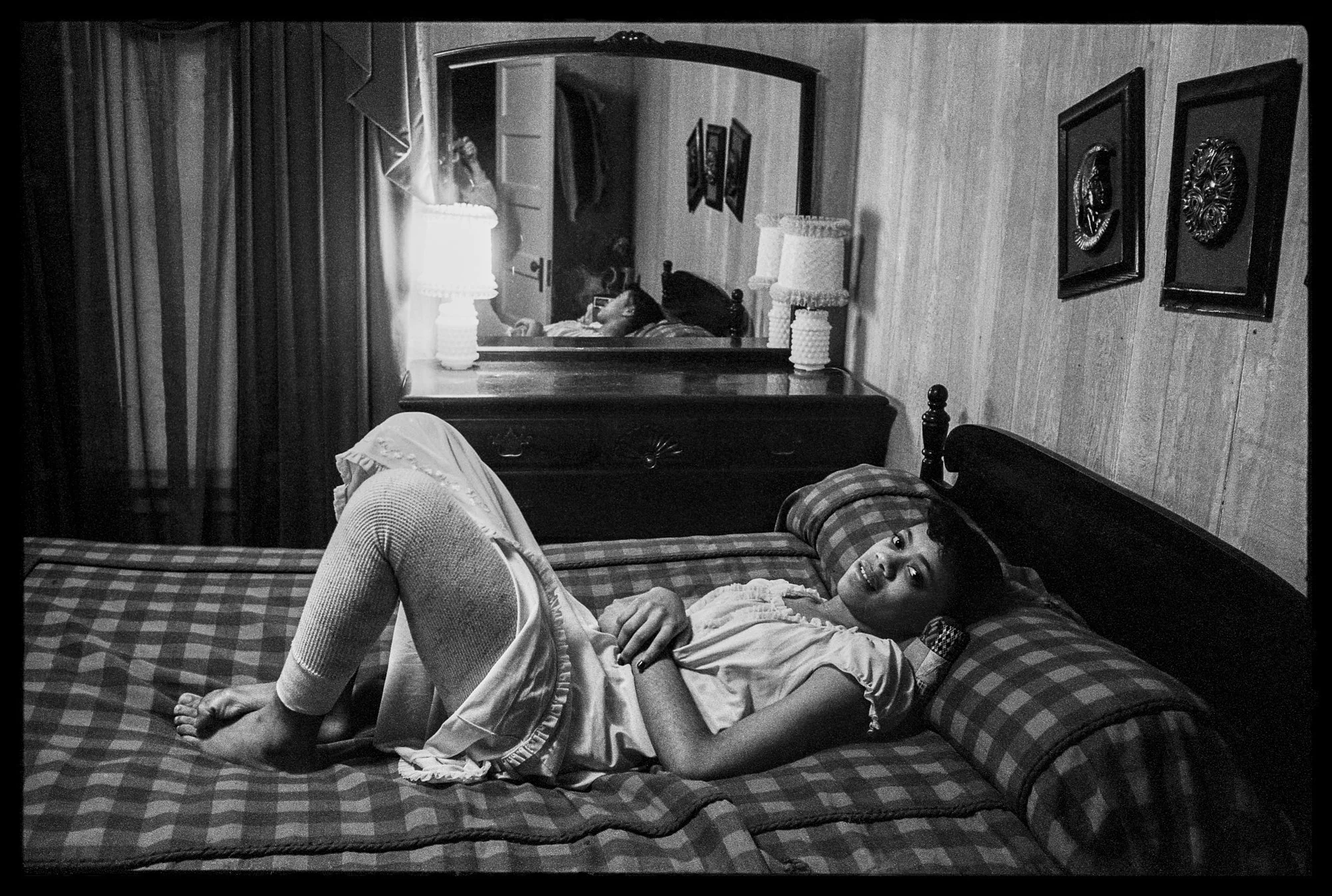 ©Lisa McCord, Cheryl on Bed, 1982.jpg