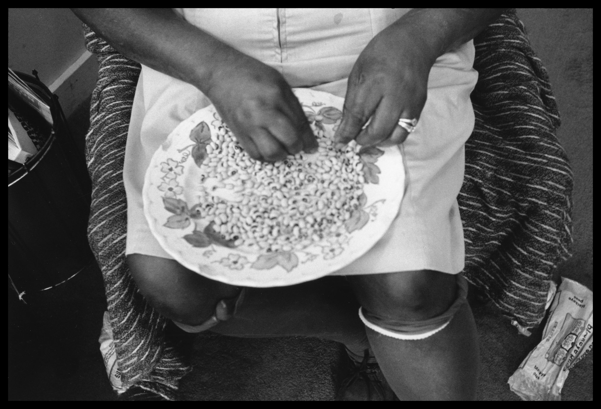 ©Lisa McCord, Cully Cleaning Black-Eyed Peas, 1980.jpg