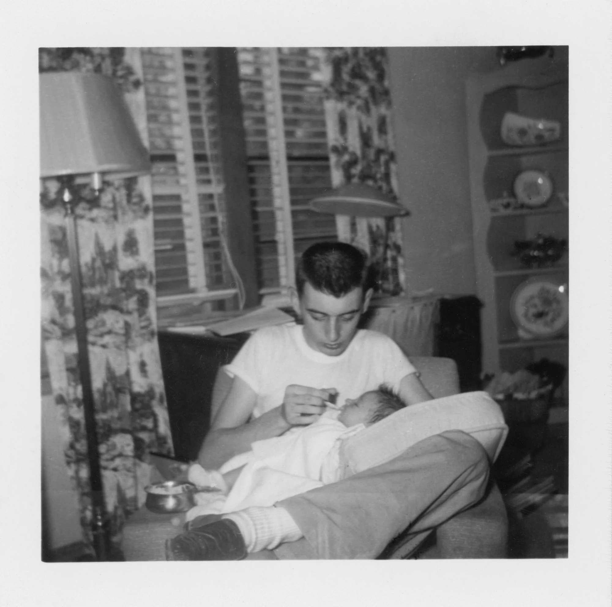 ©Lisa McCord, Dad Feeding Lisa, 1957.jpg