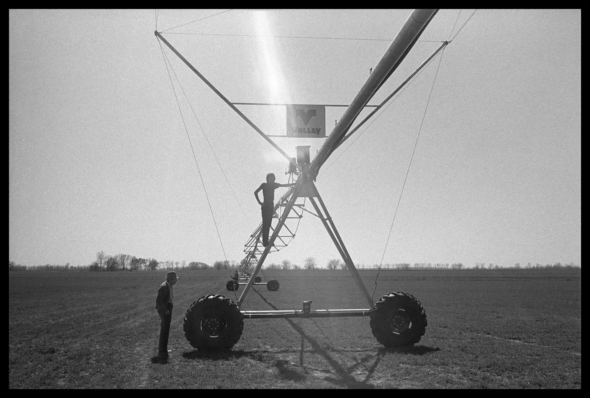 ©Lisa McCord, Granddaddy and Lind with Irrigation System, 1981.jpg