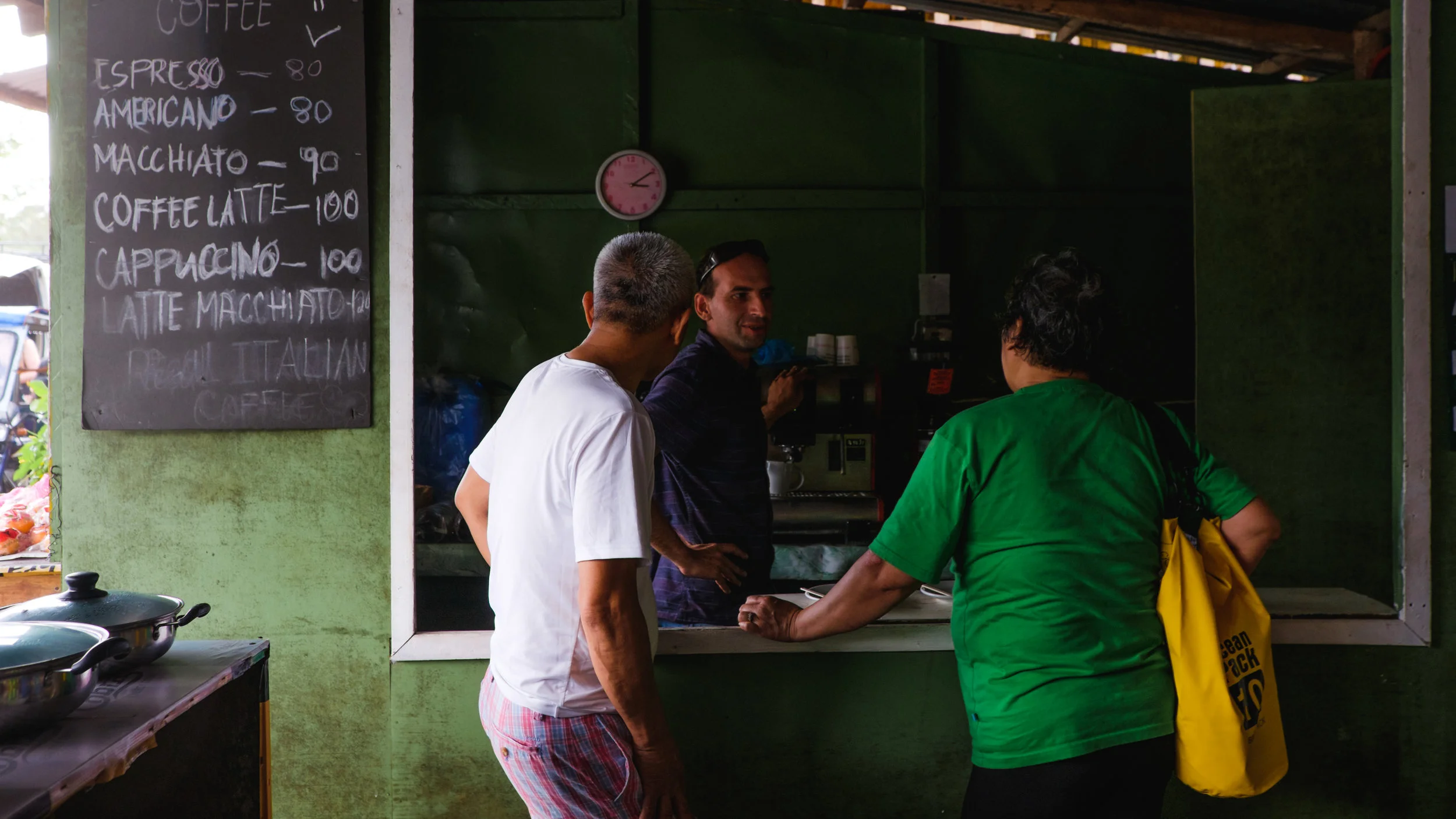 My parents getting coffee. The prices are in peso (Philippines currency).