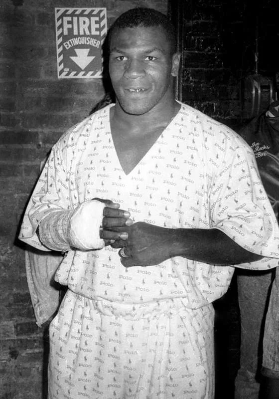 Mike Tyson in MCM leather attire, designed by Dapper Dan