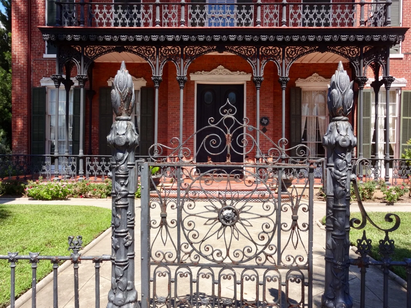 Original wrought ironwork. I imagine the moment those people stood gathered out there and found out they were free. Photo taken in 2018 by me.