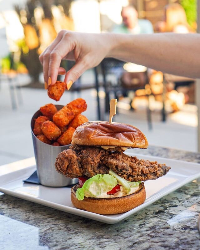 If anyone needs me, I&rsquo;ll be diving in face first into @carsonkitchen_atl spicy tots and their secret Sunday chicken sammie. This OTP spot up in @alphacitycenter is serving up some incredible dishes, which includes this sammie and tot duo and th