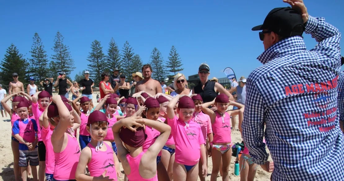 Nippers being taught important surf safety skills