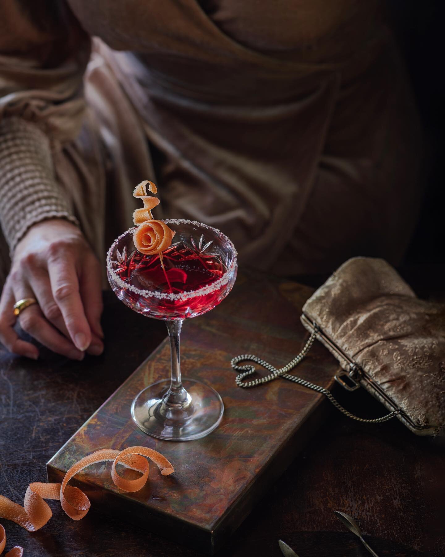 Late night cocktail. Probably in a little speakeasy somewhere, tucked in a corner taking in the atmosphere.

My first cocktail shot, and so out of my comfort zone.  It&rsquo;s a bitter Campari concoction with ruby grapefruit zest.  I&rsquo;m sure bak