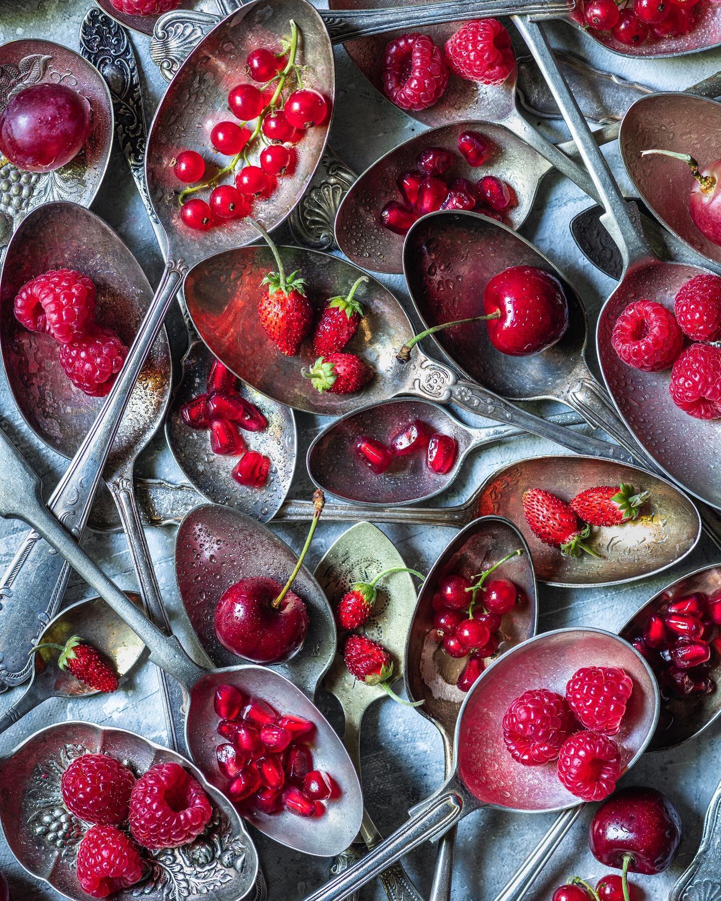 Fruity spoonfuls. 

A collection of juicy red Summer fruits on a scattered pile of vintage spoons. 
This is my first entry for the Eat Capture Share challenge this year with the overall theme of &lsquo;The client is Boss&rsquo; . The first challenge 