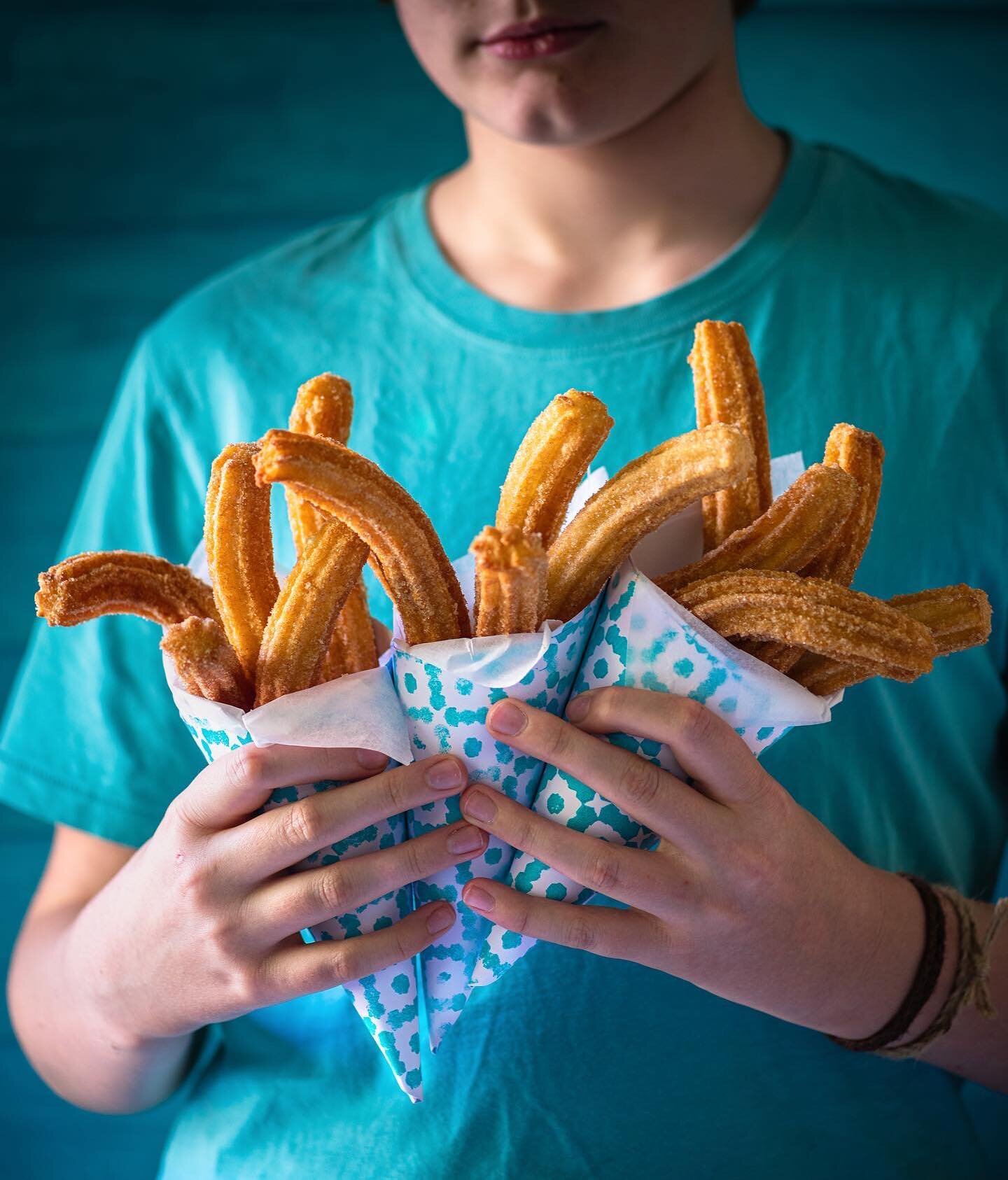 An armful of Churros cones.

Finally got there with my Day 2entry for the @eatcaptureshare_ challenge, where we journey into the concept of a &lsquo;food truck&rsquo; as a client showcasing yummy food &lsquo;on the go&rsquo; 
My idea springs from tha