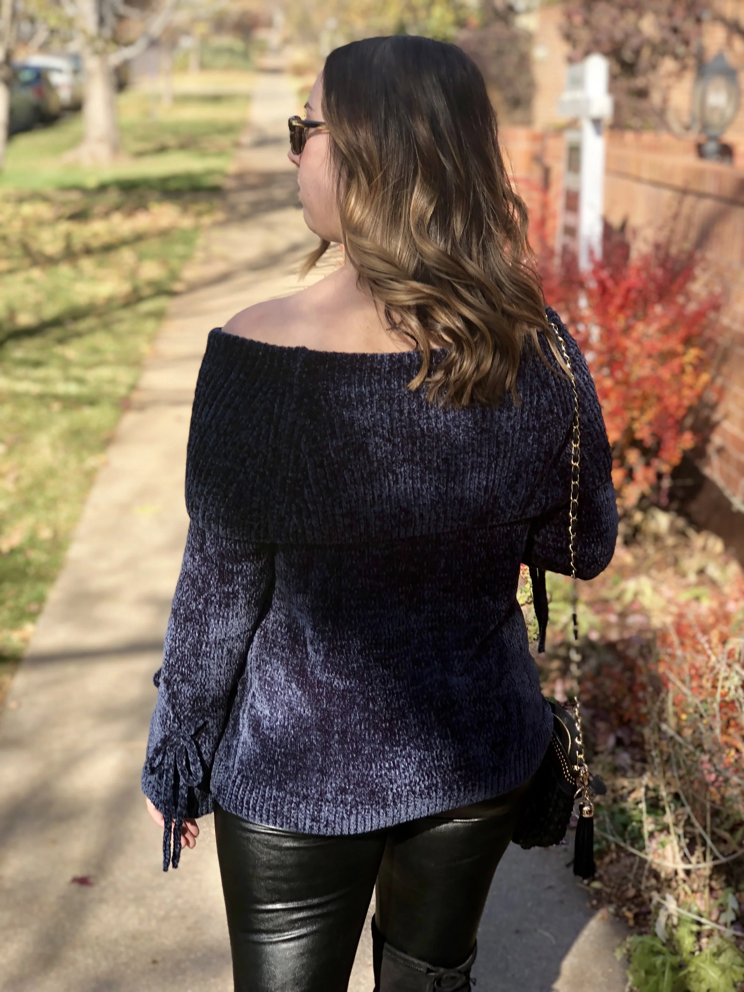 I love the bell sleeve on this sweater and the tie detail is adorable!
