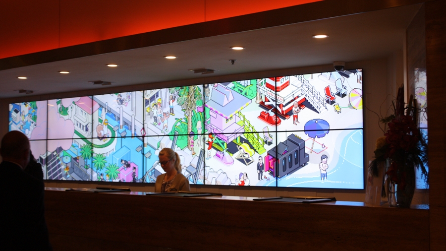 Use of the lobby's screens to display the artwork