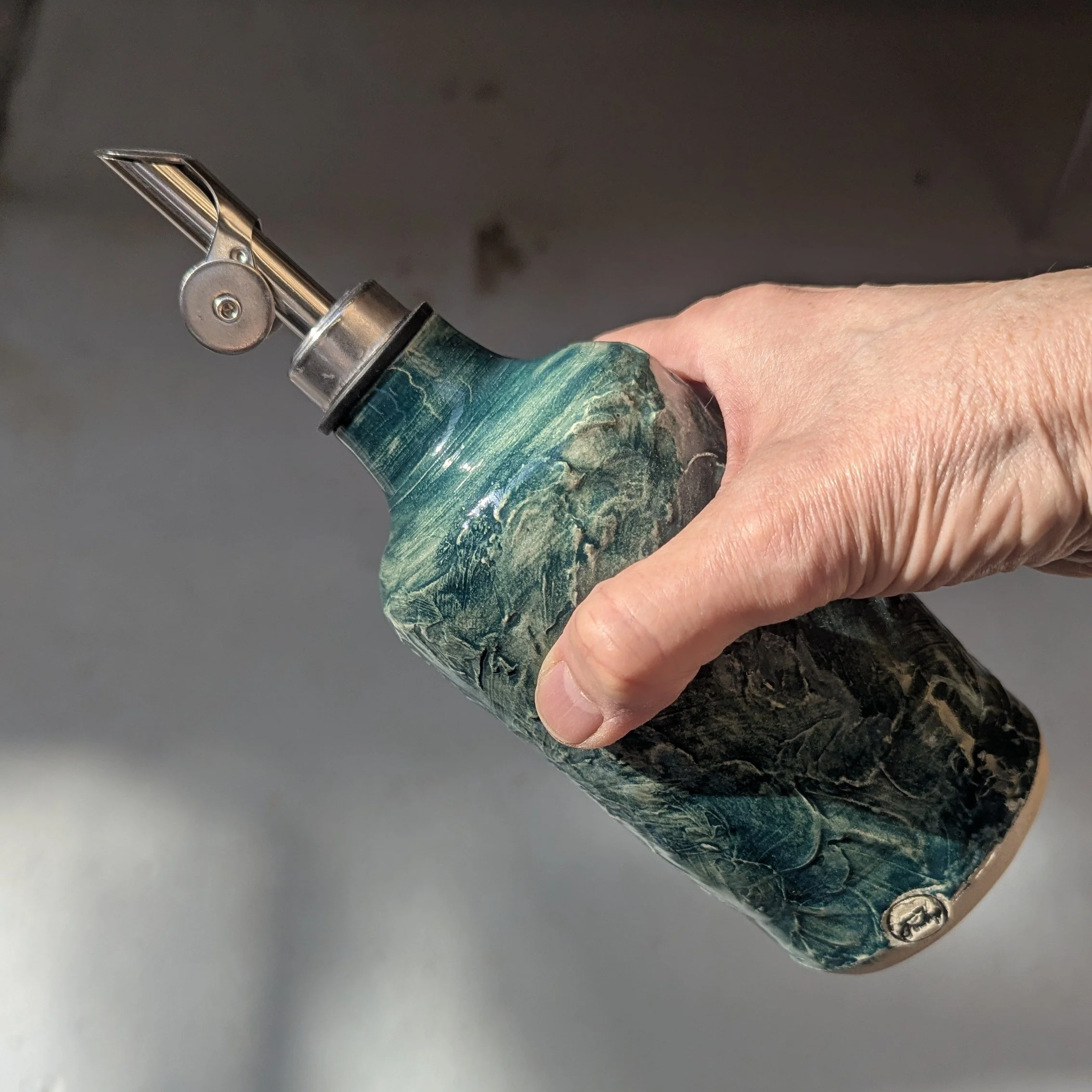 Pottery Oil Bottle in Green/Blue with texture