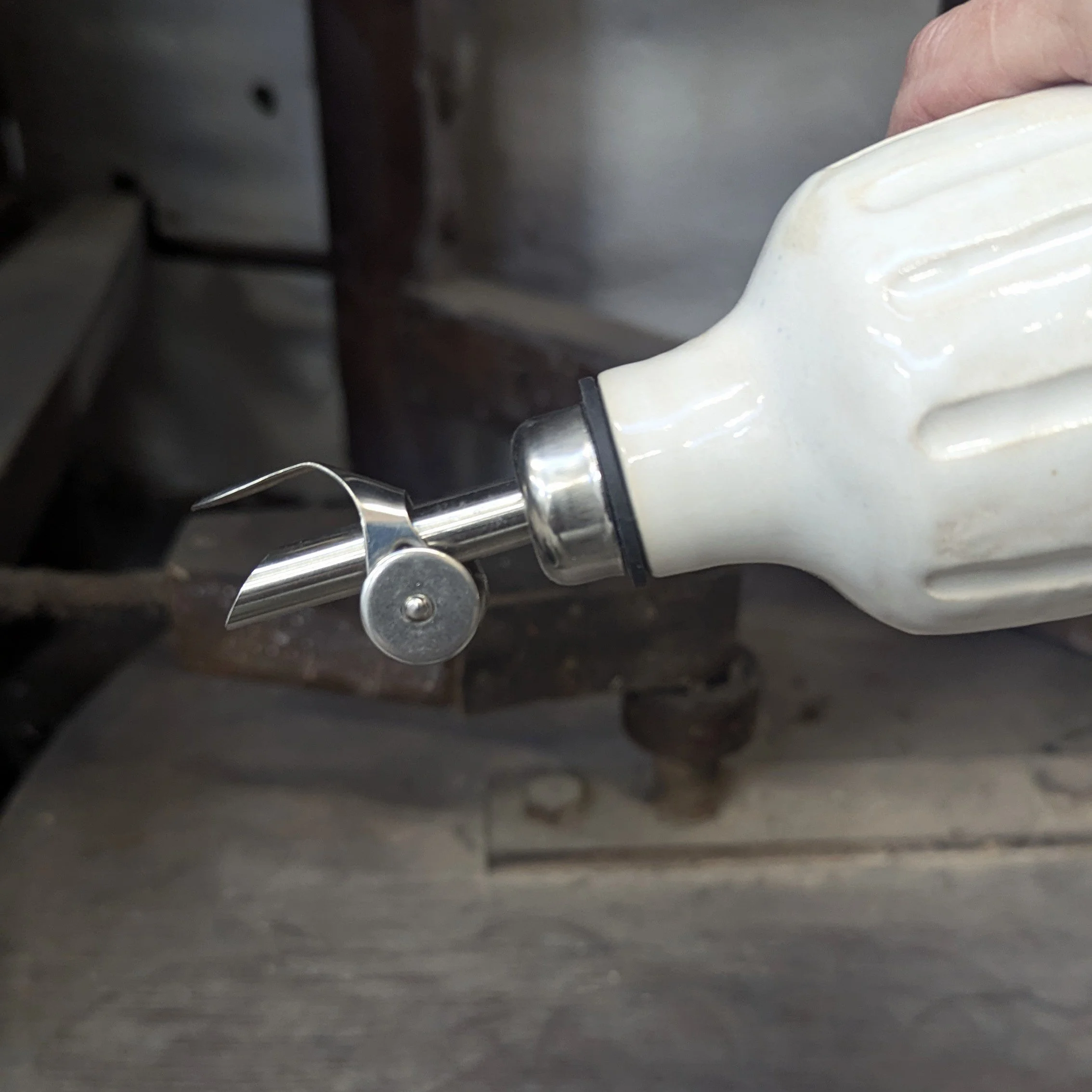 Oil dispenser with spout pottery