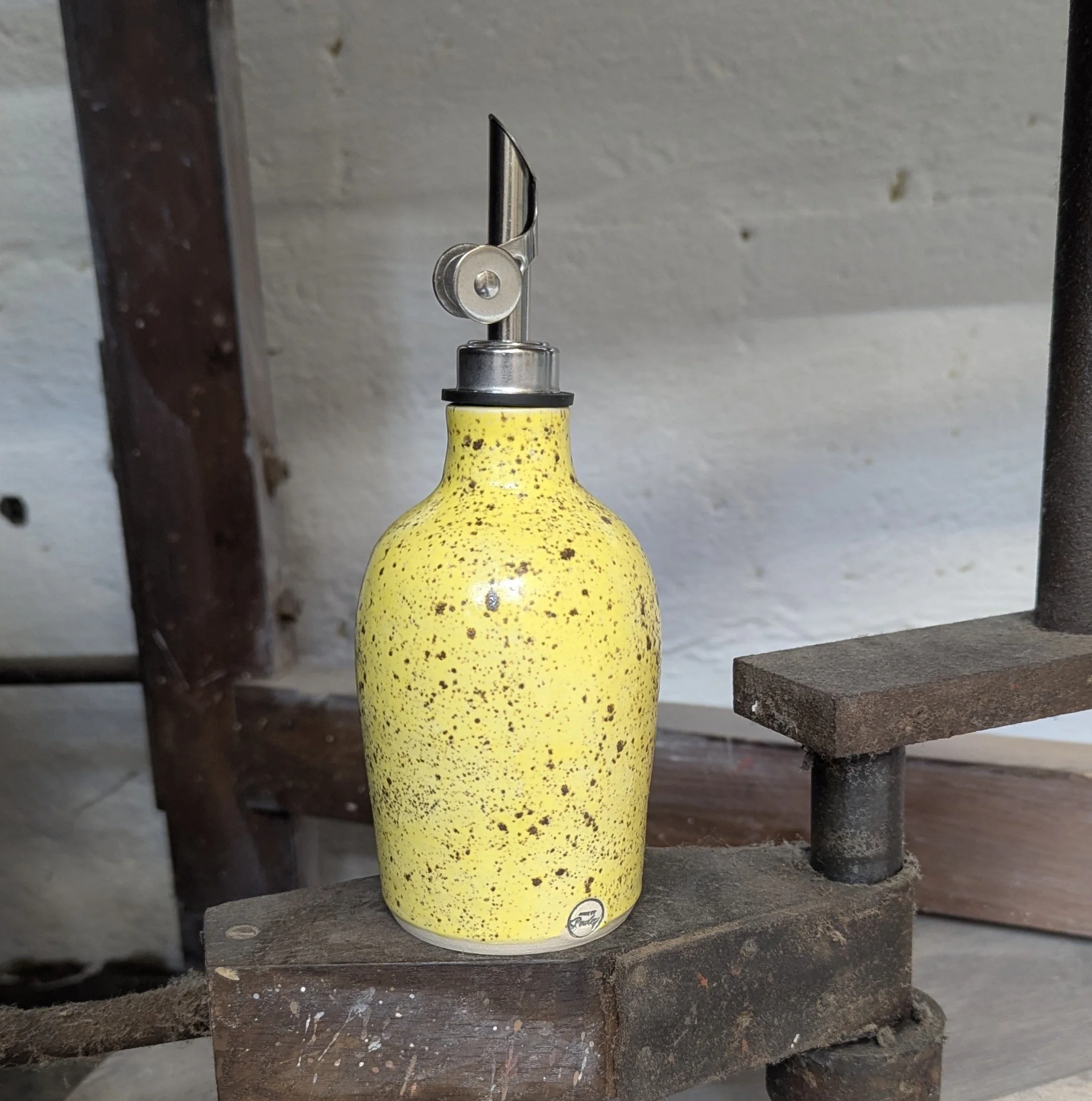 Yellow olive oil bottle