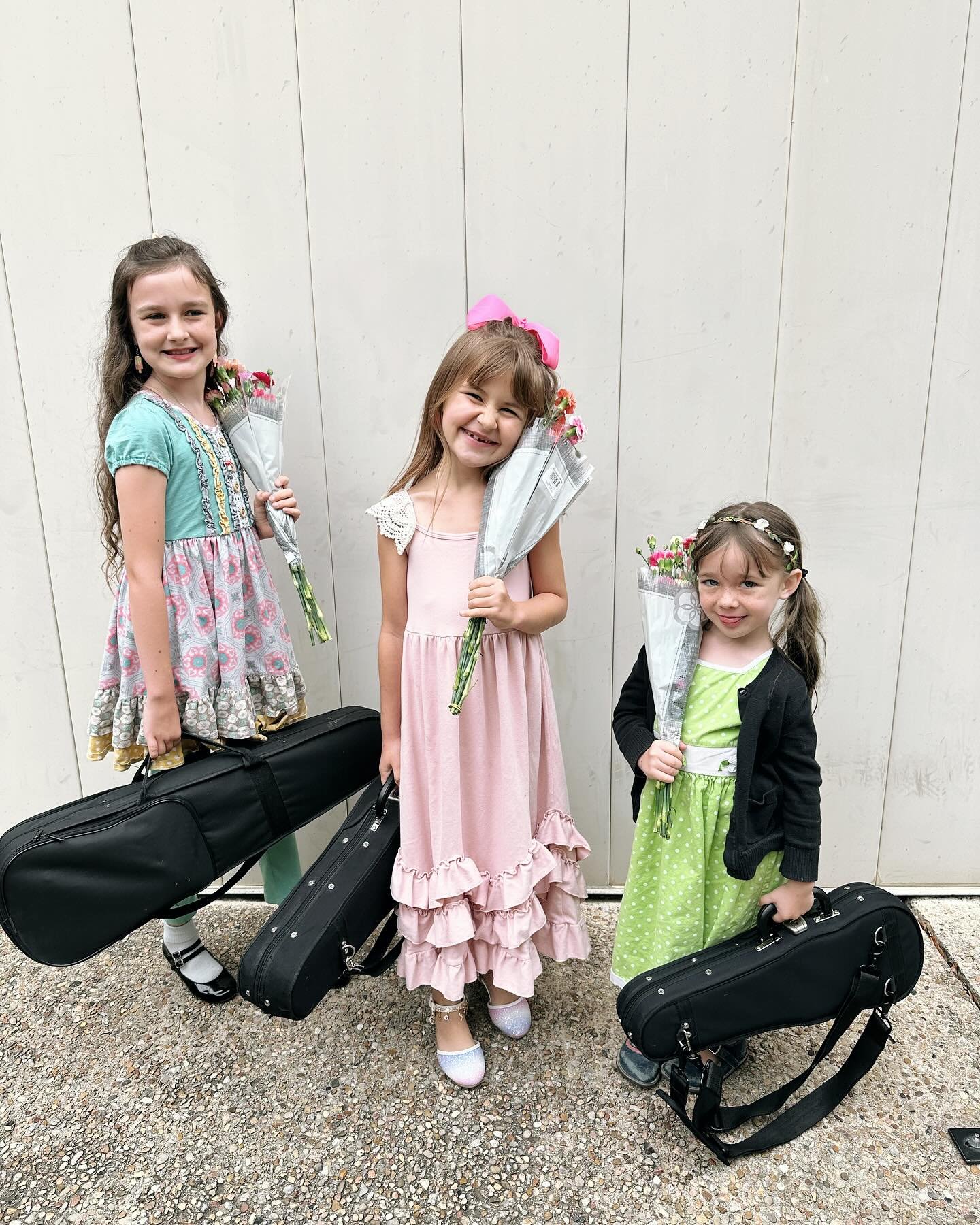 Exquisite little fiddlers pose post recital