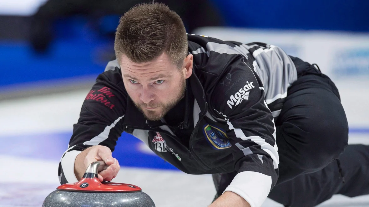 Mike McEwen beats Brad Gushue for 7th Grand Slam title