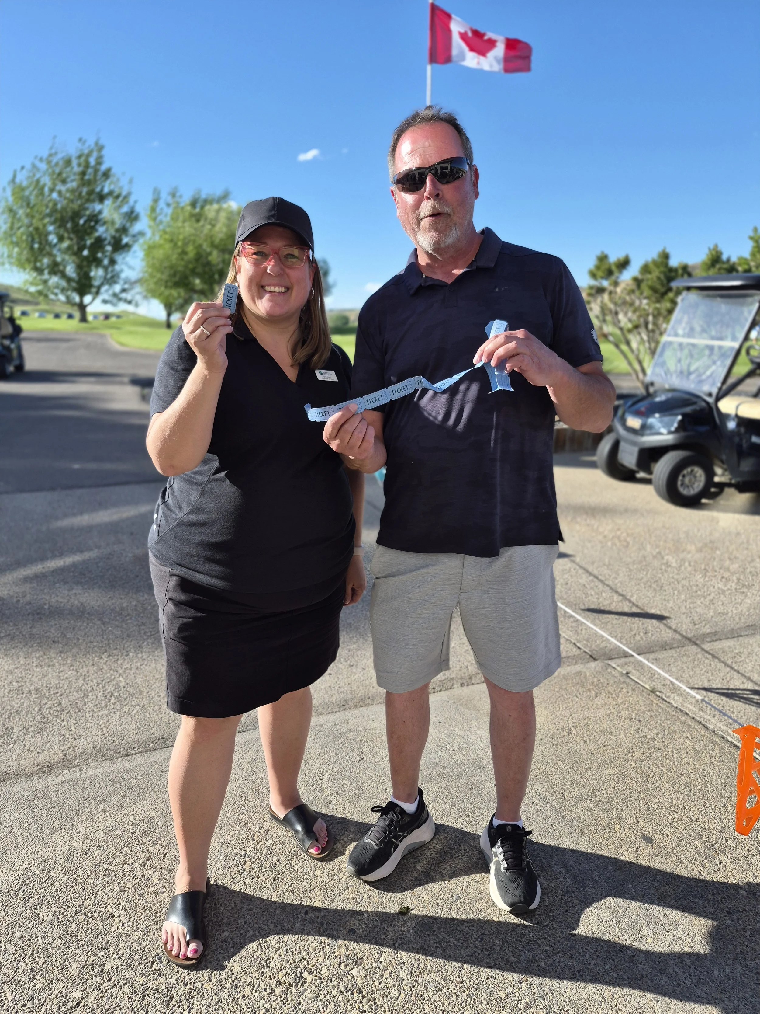 Erin Low (LCA) with Bryan (Tetra Tech) our 50/50 Winner