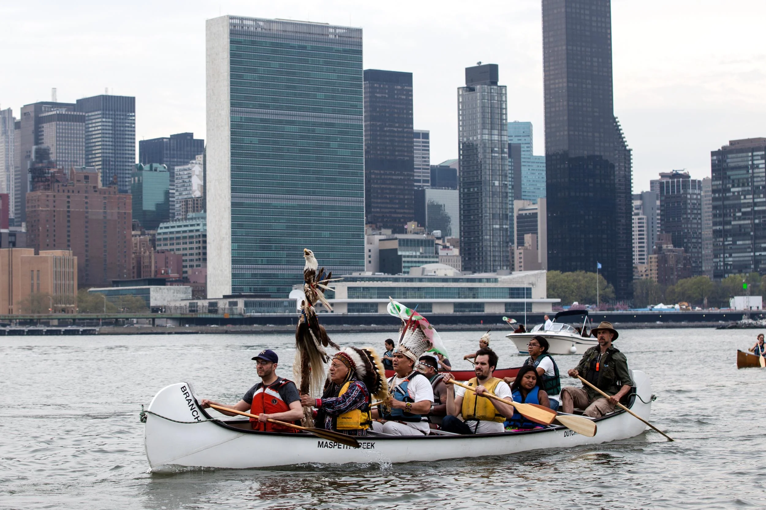 International indigenous leaders stage an action paddling canoes to NYC's UN building, where 2016 climate talks were taking place without their inclusion.