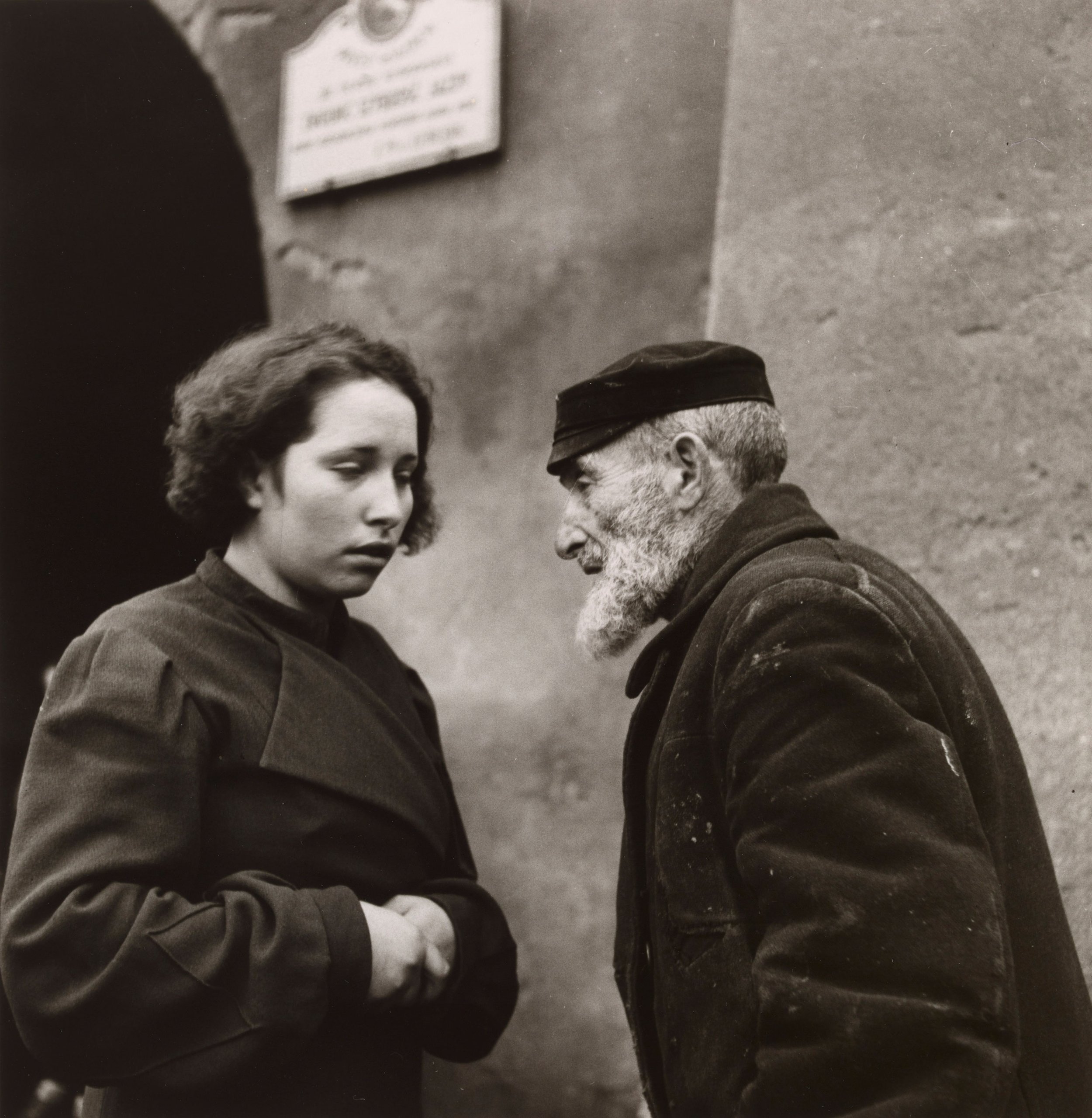 Roman Vishniac (United States, born Russia, 1897–1990),  Granddaughter and Grandfather, Lublin, Poland , 1937, gelatin silver print, 10 5/8 x 10 5/16 inches. Promised Gift from the Judy Glickman Lauder Collection, 1.2000. © The Magnes Collection of 