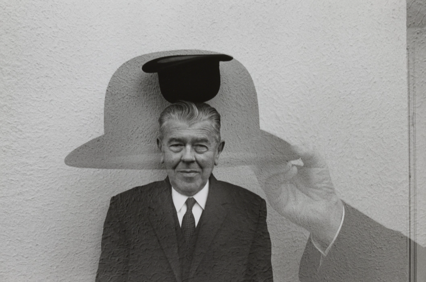   Duane Michals  United States, born 1932   Magritte with Hat , 1965 gelatin silver print, 6 1/2 x 10 inches Promised Gift from the Judy Glickman Lauder Collection, 2.2015.1 