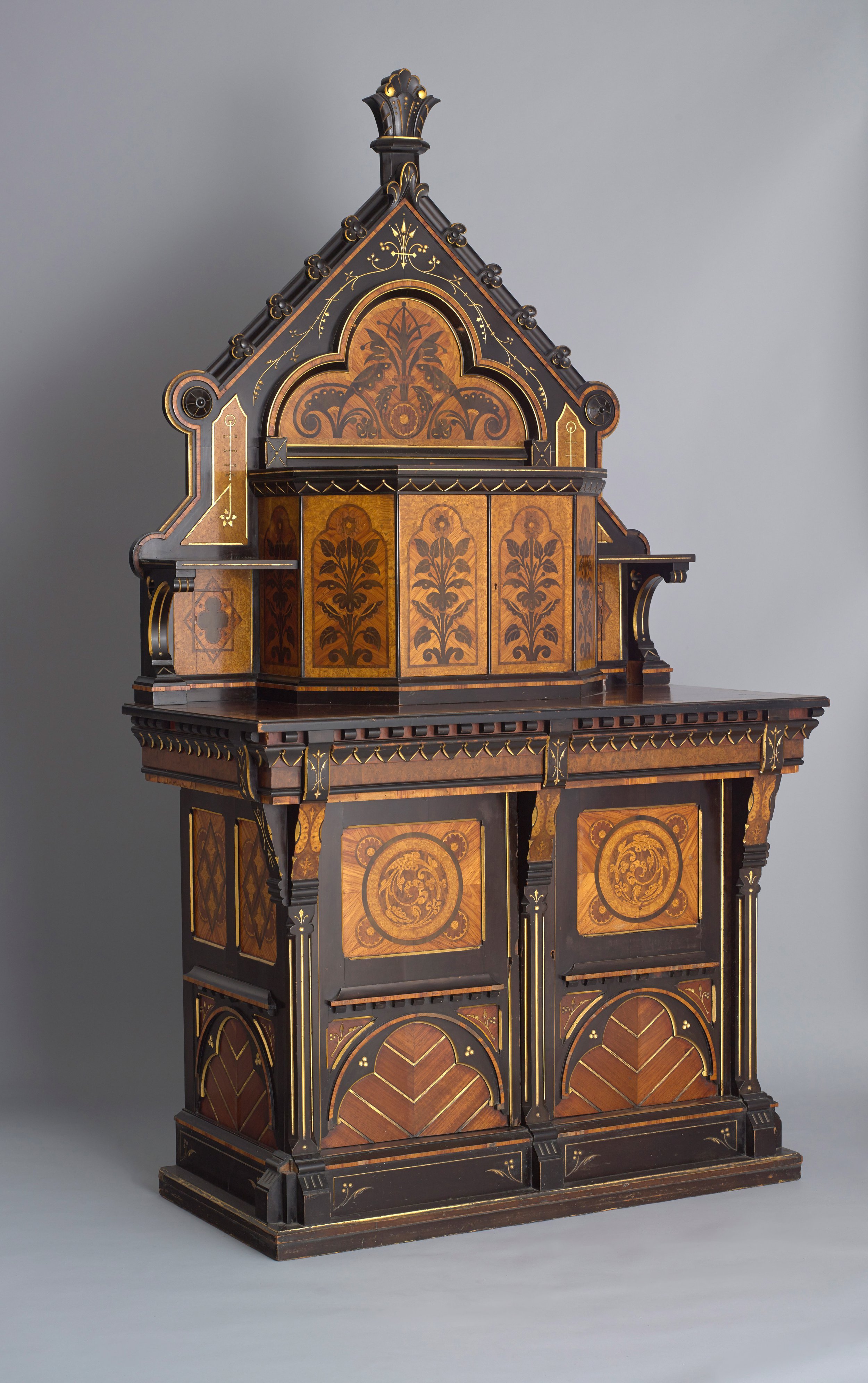   Bruce James Talbert  England, 1838–1881  Cabinet , circa 1867 walnut with gilt, incised, and ebonized marquetry, 87 1/4 x 47 1/8 x 24 5/8 inches Museum purchase, 1985.99a-i 