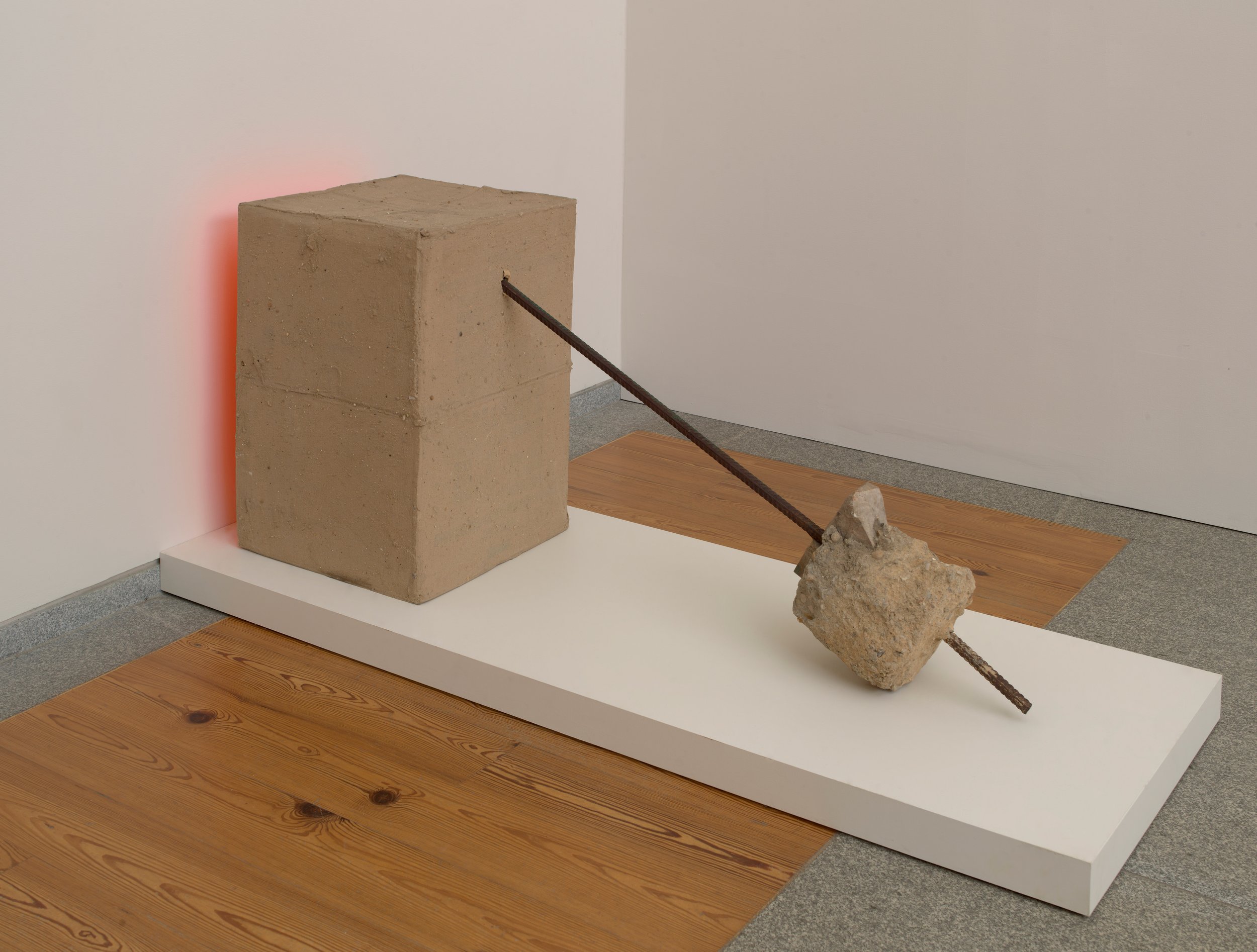  Robert Rauschenberg  United States, 1925–2008  Untitled (Early Egyptian) , 1973 sand and acrylic on cardboard with rebar and cement, 29 7/8 x 21 1/8 x 65 3/4 inches Gift of the Alex Katz Foundation, 2022.27.6 