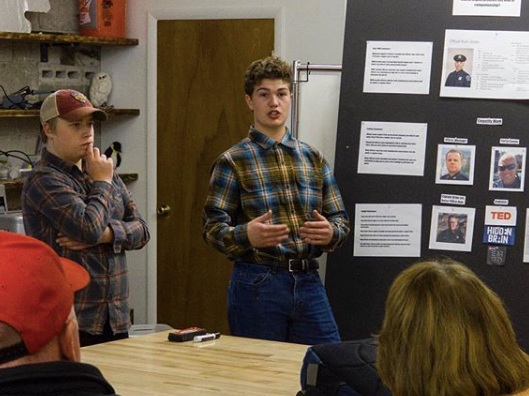 Practicing our Design Lab presentations for members of the community