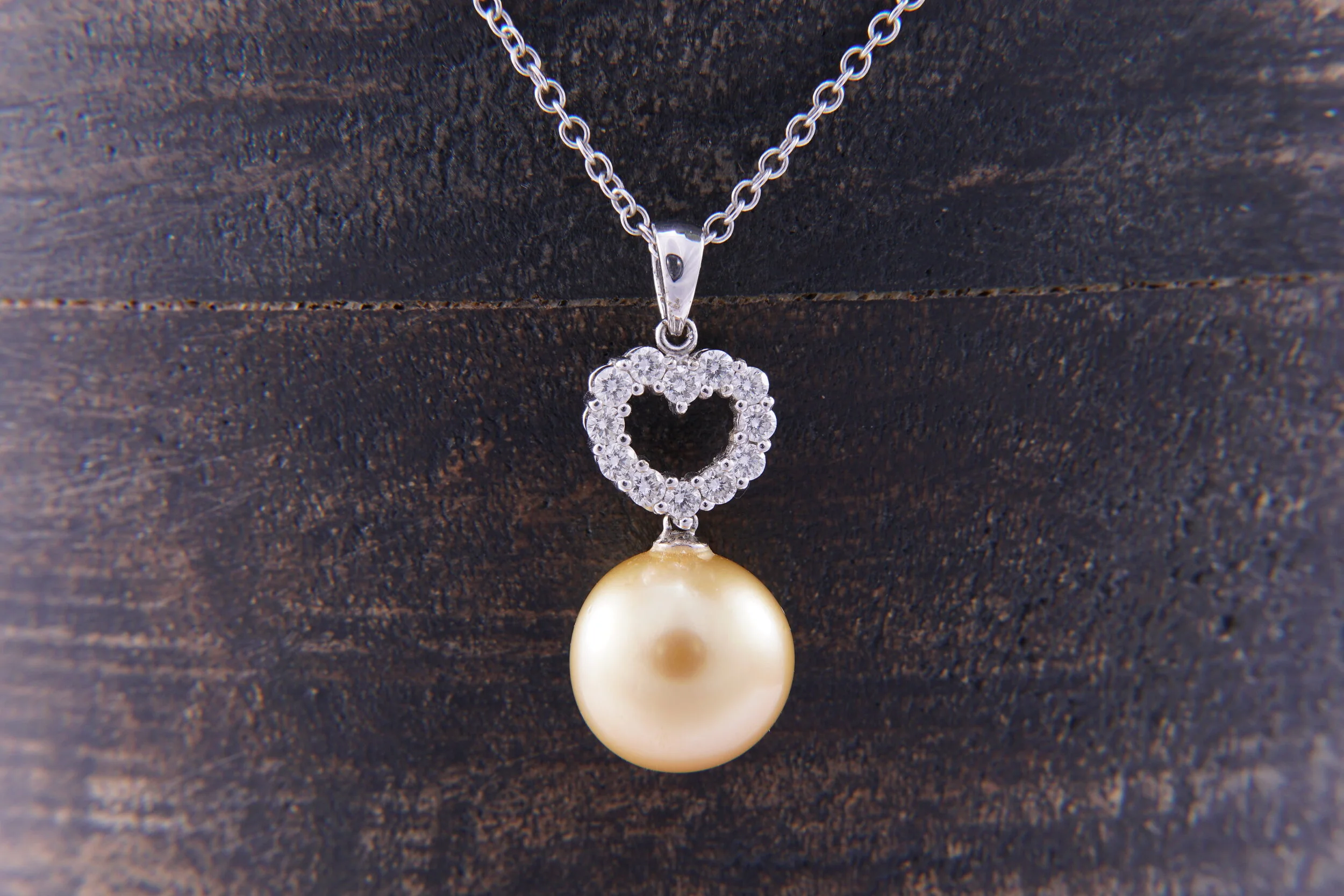 Golden South Sea Pearl Pendant with a Multi-Diamond Heart Shape