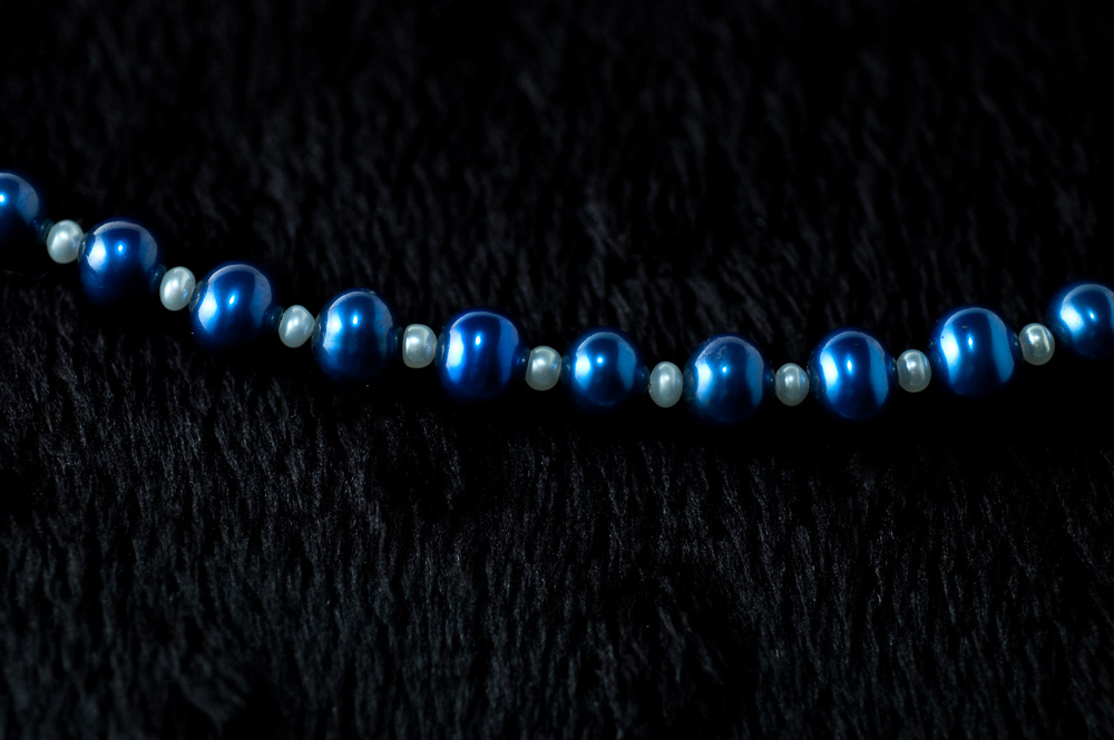  Dark blue and white pearls  18”  $29.95 