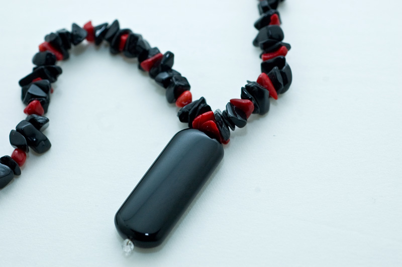  Black onyx pendant with black onyx and red-dyed coral  18”  $29.95 