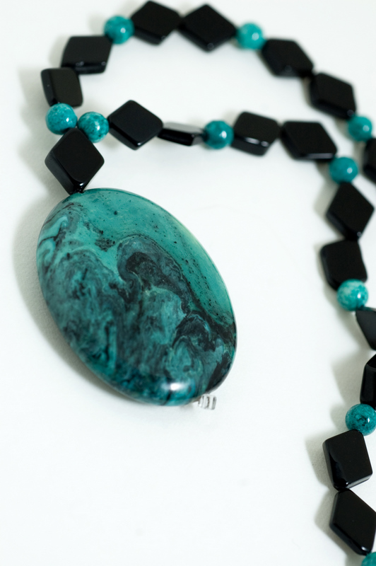  Turquoise pendant with turquoise and black jade  16”  $49.95 