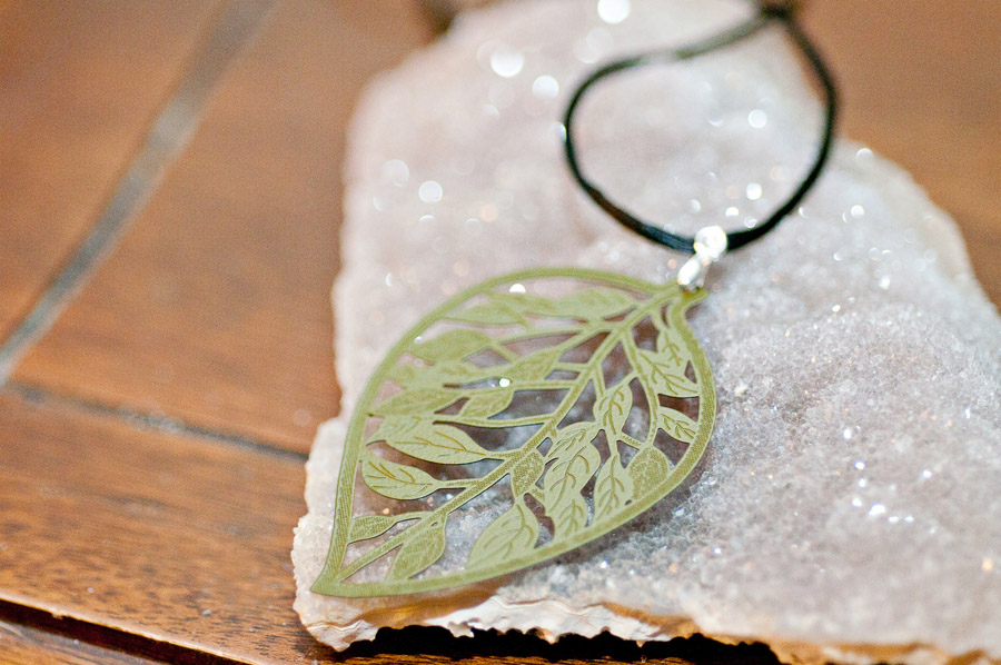  Light green leaf (brass metal stamping), black cord and silver findings  18”  $19.95 