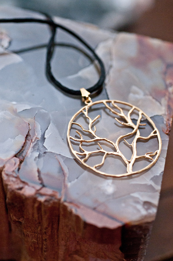  Gold tree of life, black cord and gold findings  18”  $19.95 