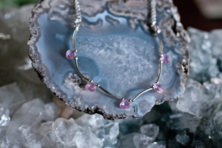  Pink cubic zirconia (5 drops) with silver spacing and chain  18”  $24.95   