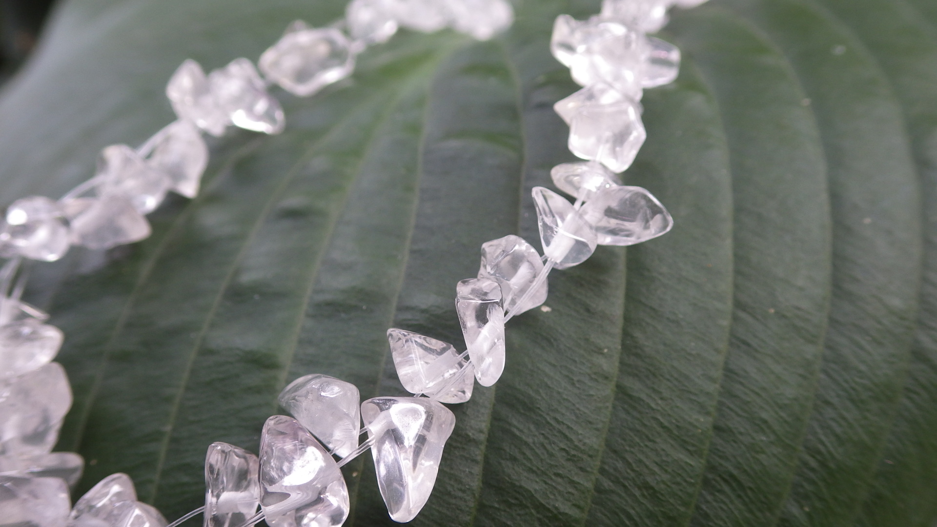  Quartz chips (floating) and silver findings  18”  $19.95 
