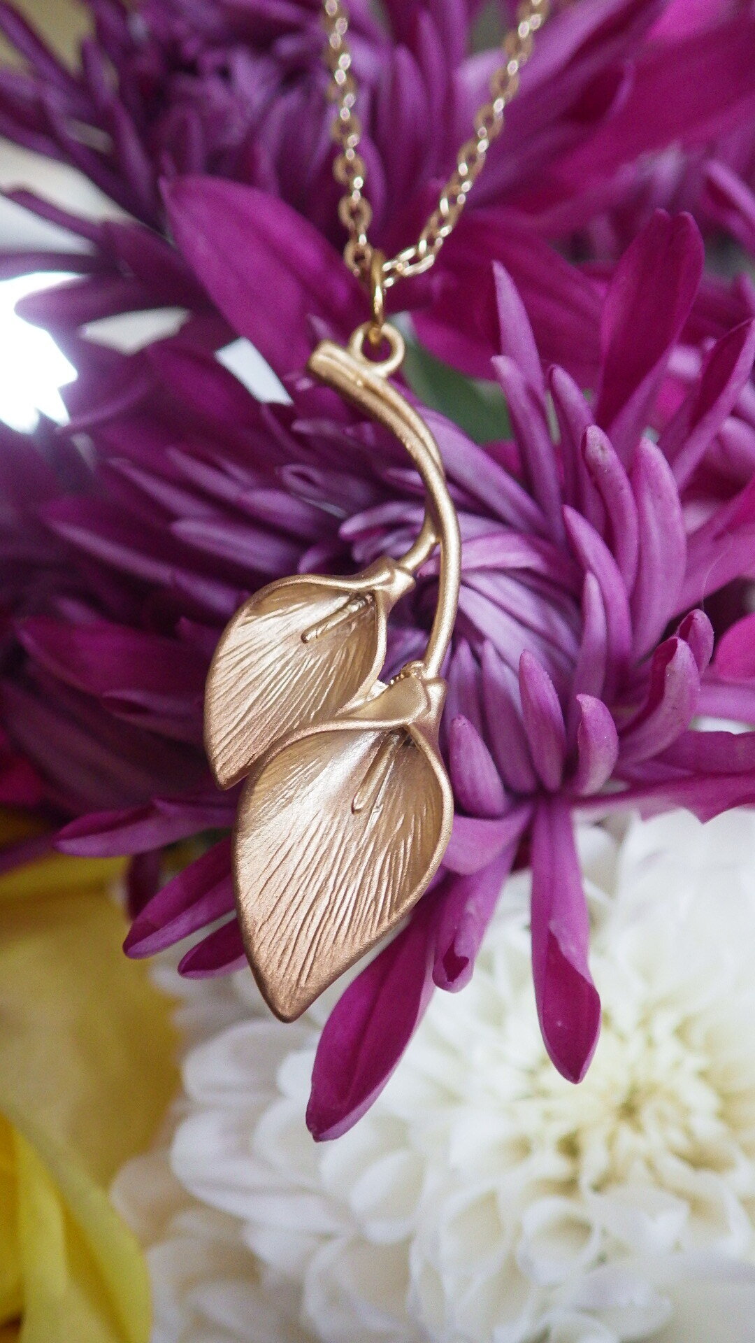  Gold calla lily pendant on gold chain  18”  $19.95 