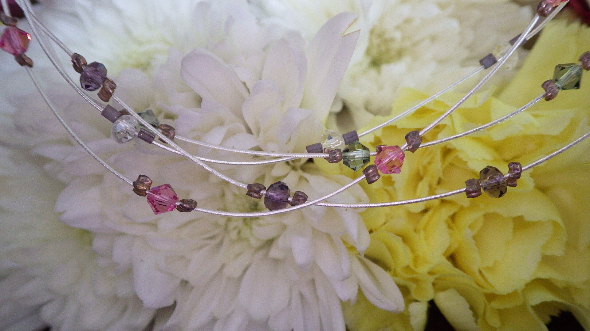  Floating purple, pink, green Swarovski and crystal with silver findings  18”  $29.95 