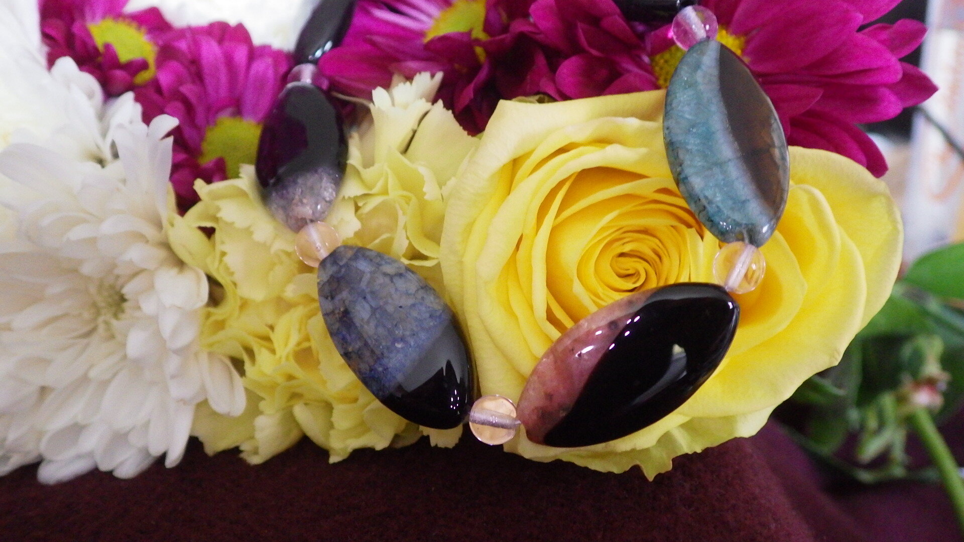  Multi-coloured dyed quartz with pink quartz spacers and silver findings  18”  $29.95 