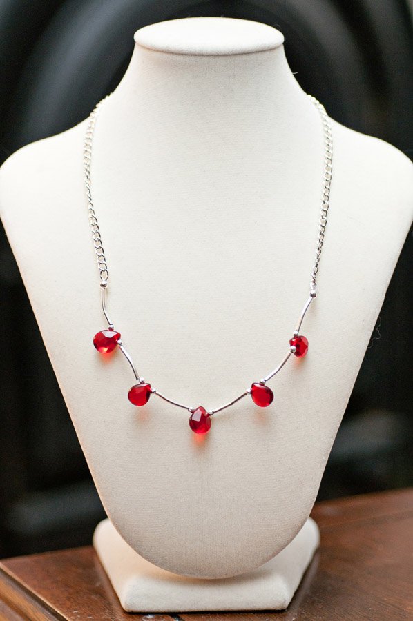  Red teardrop crystal (5 drops) with silver spacing and chain  18”  $24.95 