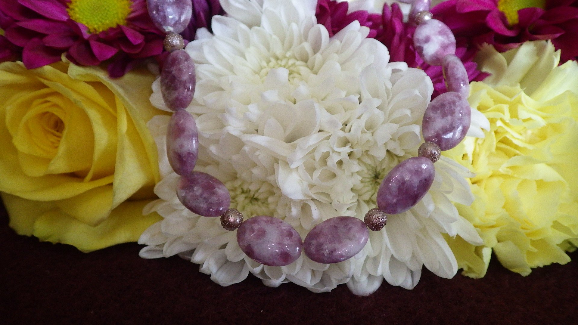  Purple lepidolite with bronze spacers and bronze findings  18”  $34.95 